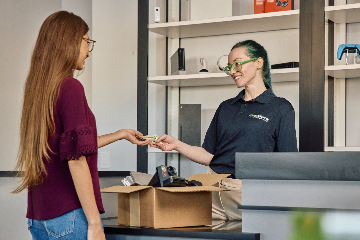 Woman selling electronics 