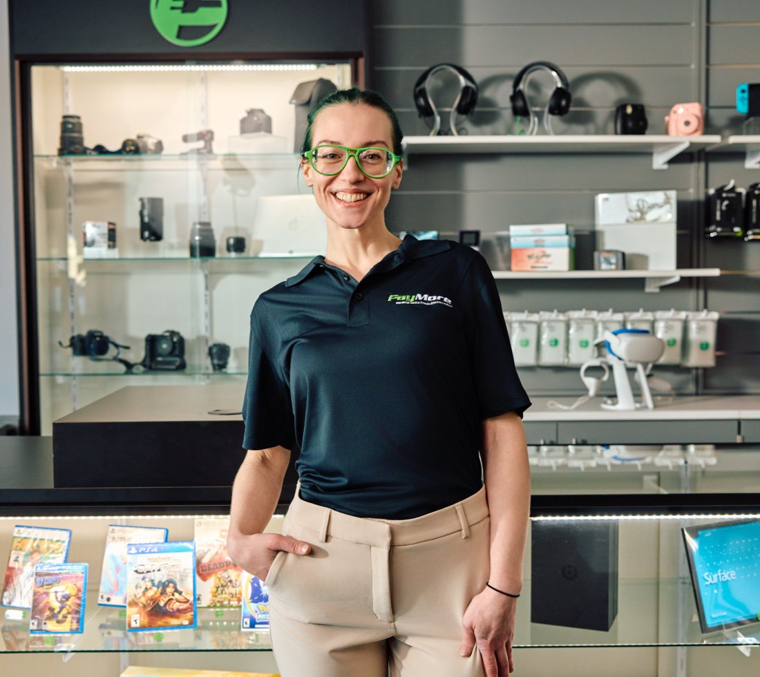 PayMore employee with glasses